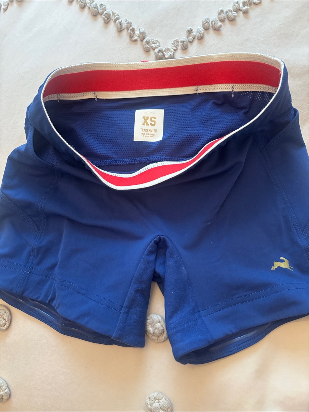 Tracksmith Navy Running Shorts with Red Waistband